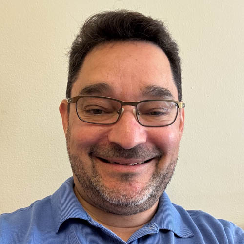 Headshot of Christopher Rolon.