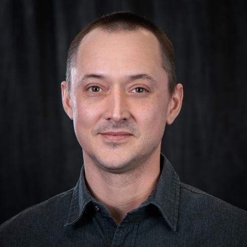 Headshot of Matthew Wallhead.