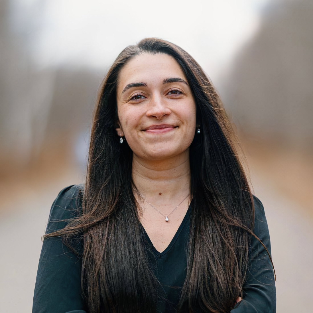 A photographic headshot of Bayley.