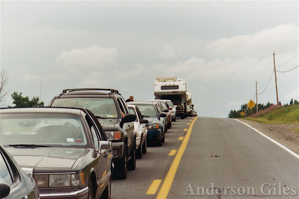 Long line of cars on the highway waiting to get into the concert