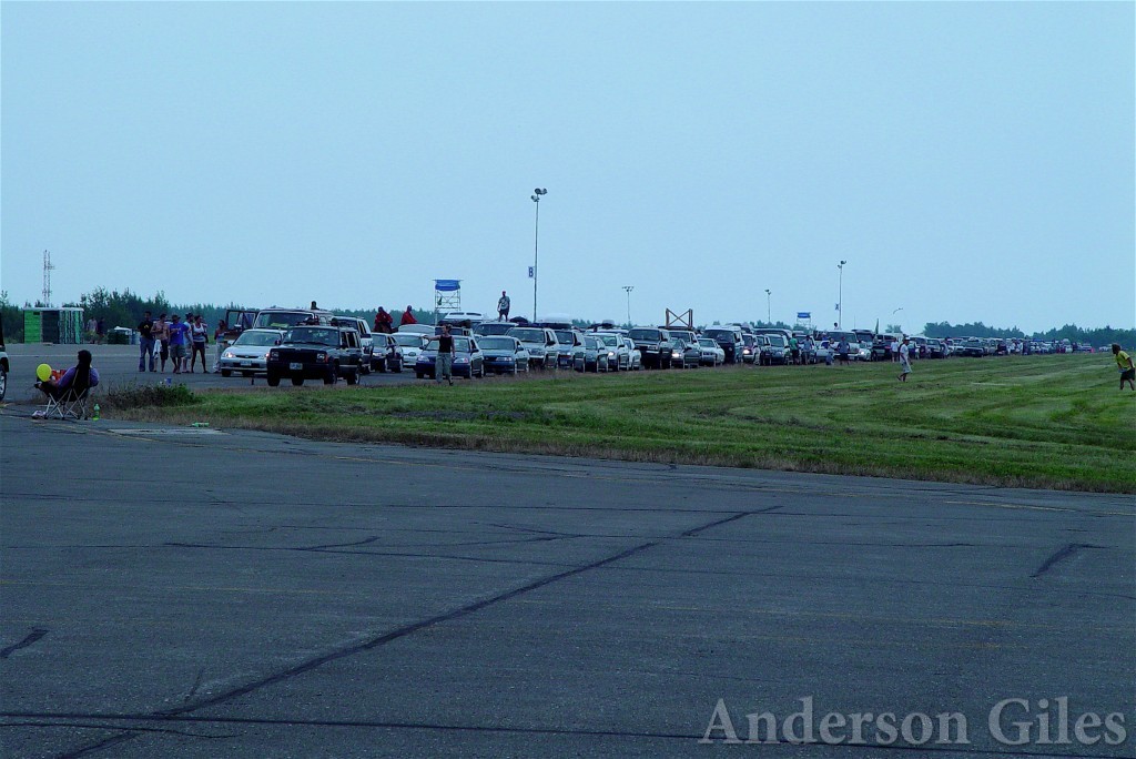line of cars on the runway