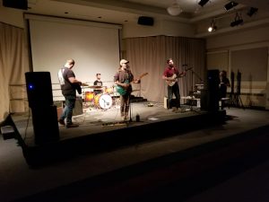 photo of band at concert